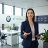 Female health tech founder smiling in modern office